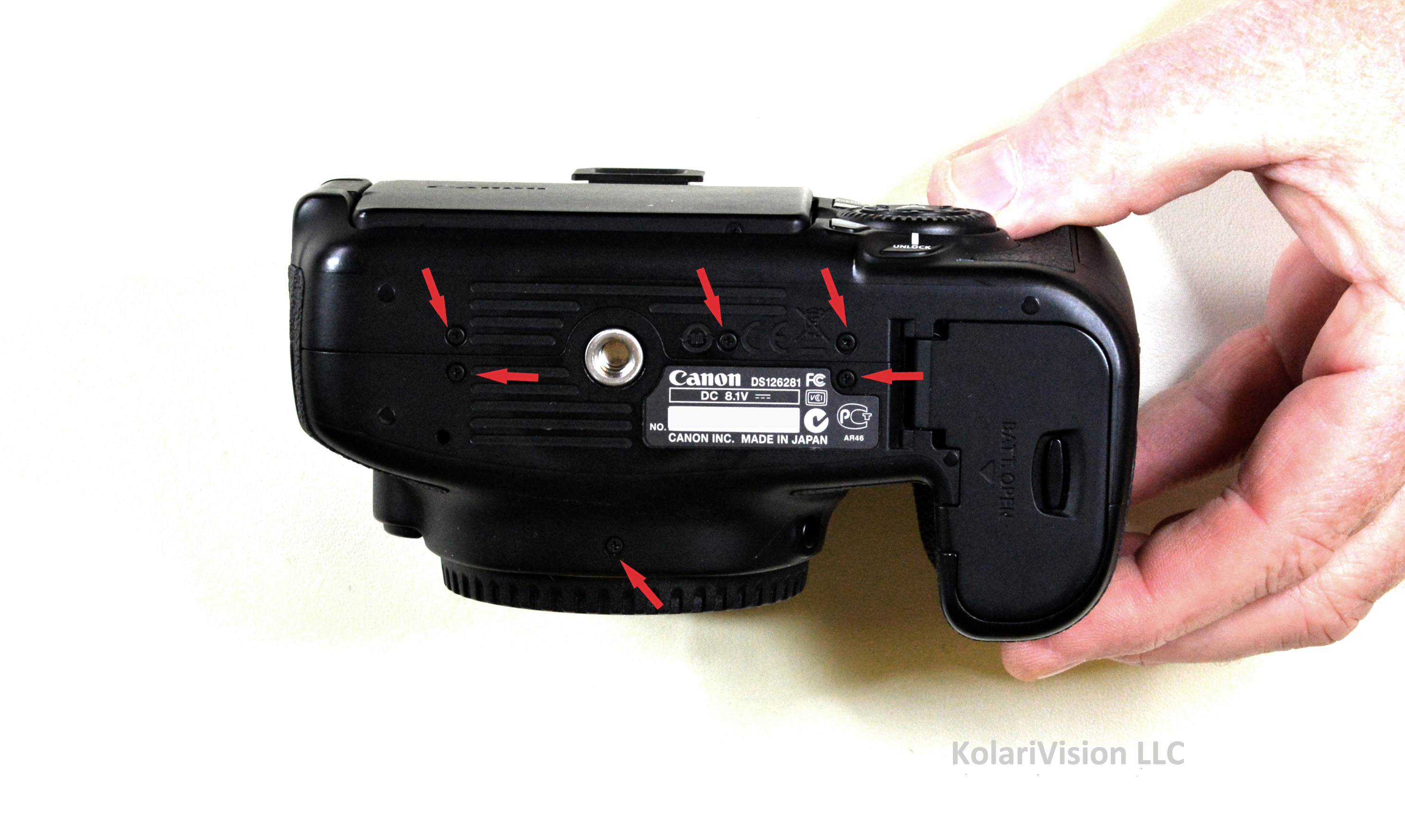 Canon EOS 60D Infrared Conversion DIY Tutorial and Disassembly Guide Turn camera so that the bottom is facing you and remove the 6 screws as indicated These 6 screws loosen up the back LCD panel and front panel