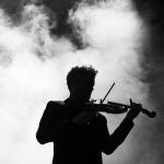 Thumbnail of Backlit silhouette photo taken with only available light, showing a subject in dark outline against a bright background