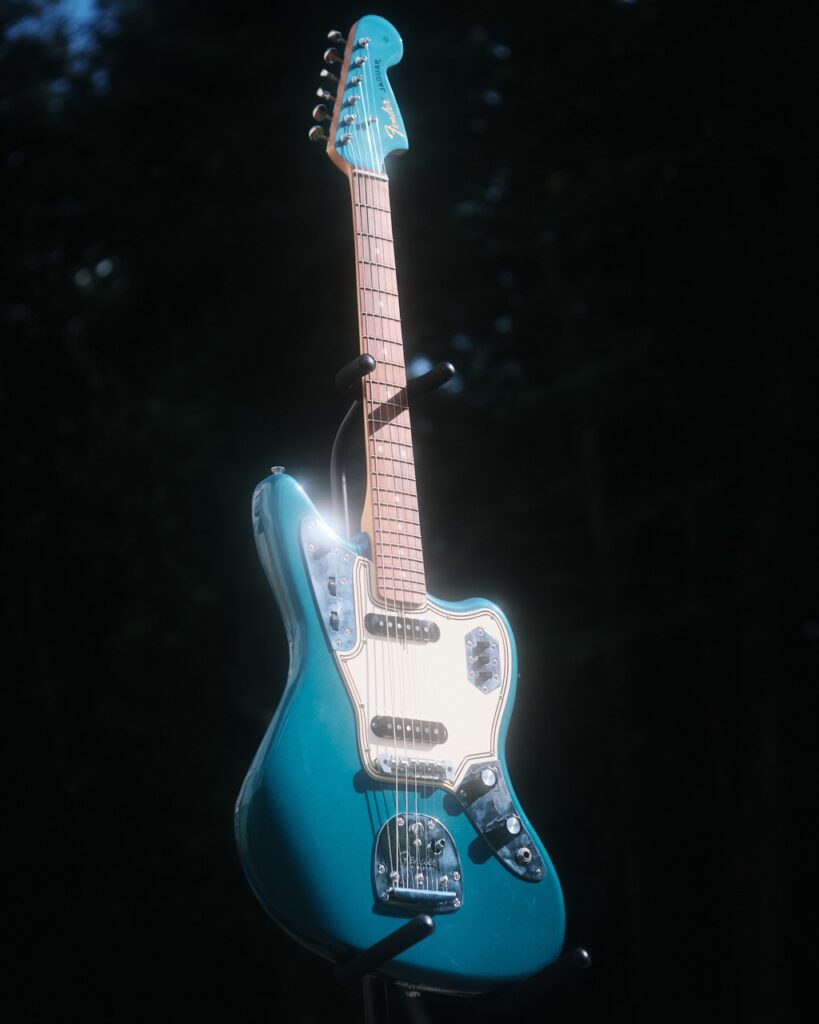 Mist diffusion filter example showing a pronounced hazy glow around guitar and a softening of details